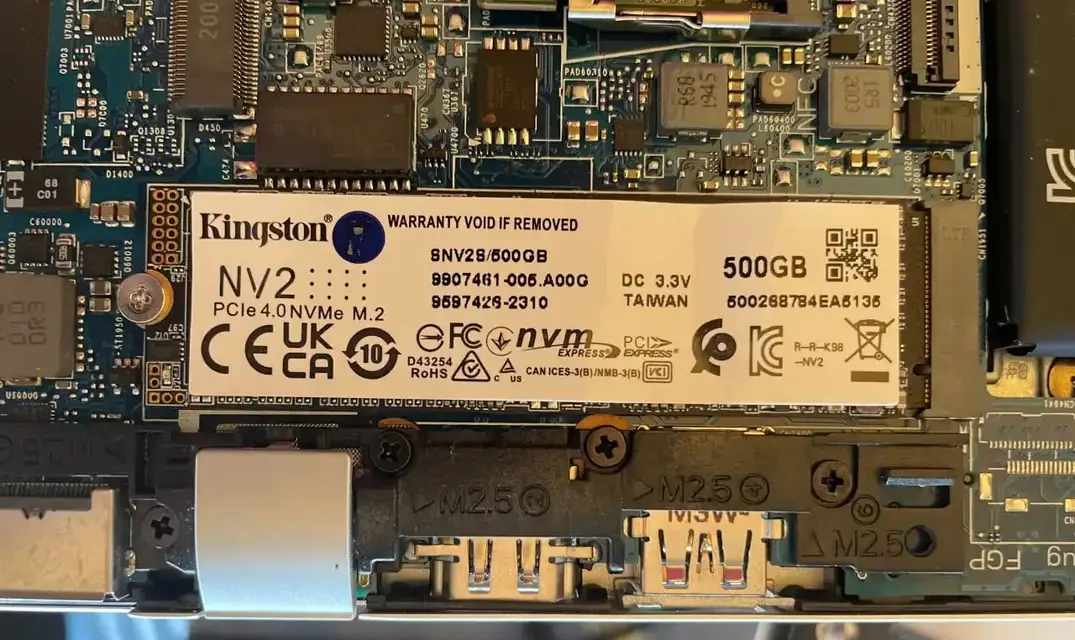 Kingston NV2 500GB SSD installed on a laptop motherboard