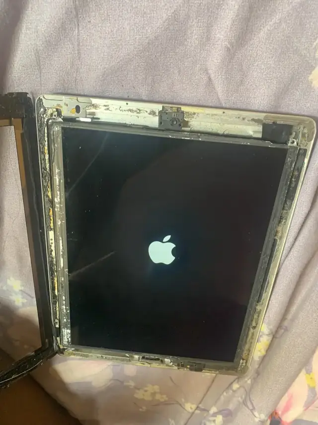 iPad with its screen removed during a display replacement