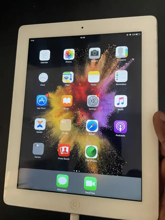 White iPad on the home screen after being restored